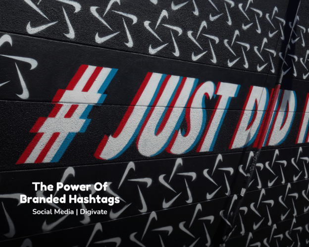 A graffiti wall shows the branded hashtag #justdidit from the brand Nike, which is known for building social media buzz.