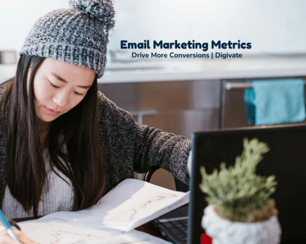 a woman wearing a beanie writing on a page full of graphs