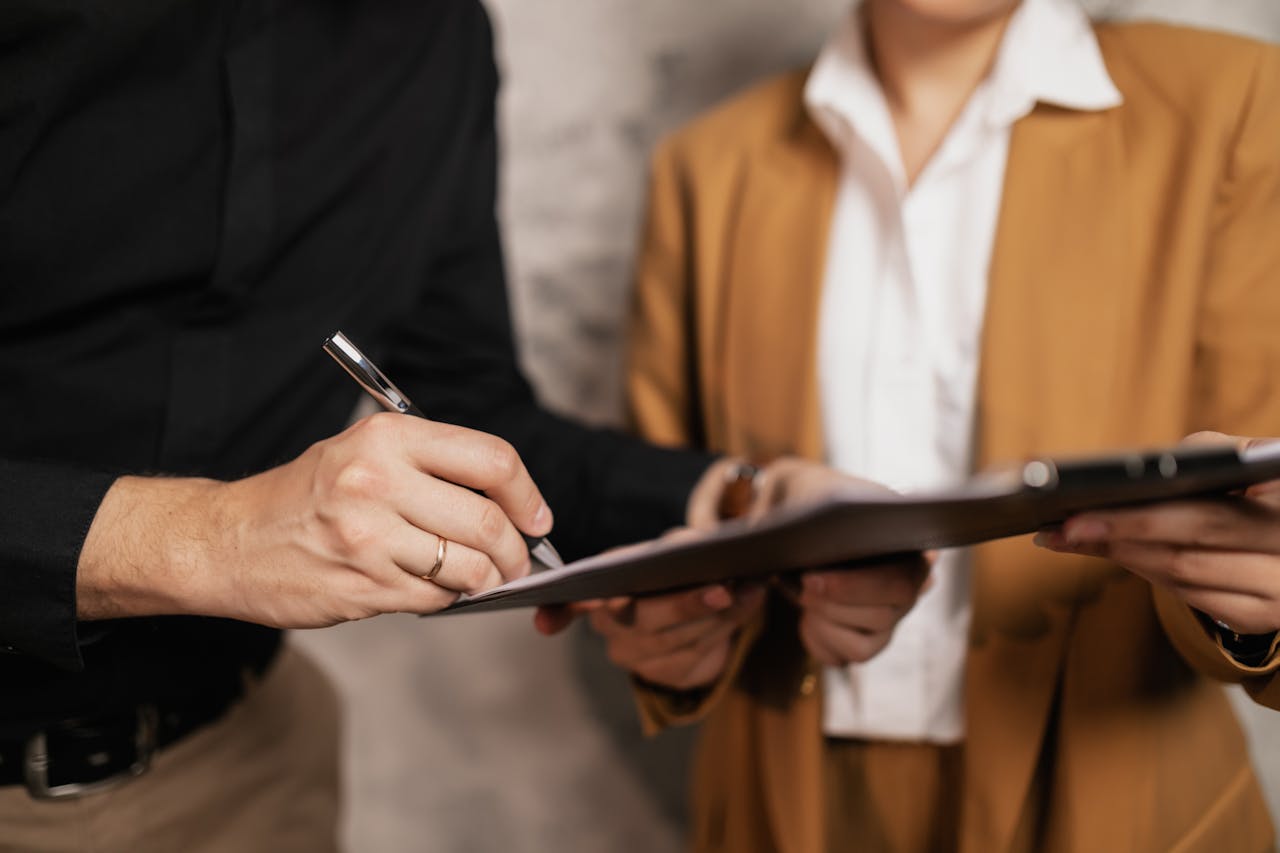 a person signing a document